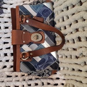 Coach patchwork blue shoulder bag with brown straps.